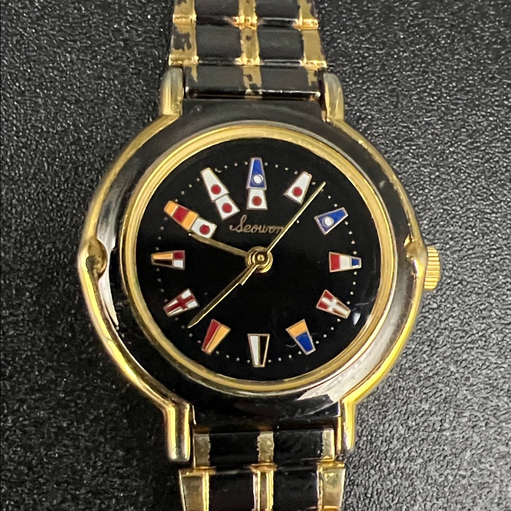 Seowon Women’s Gold-Tone Black Dial Admiral’s Cup Nautical Flag Watch